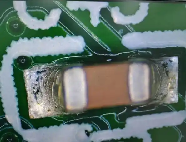 Glassy flux residue